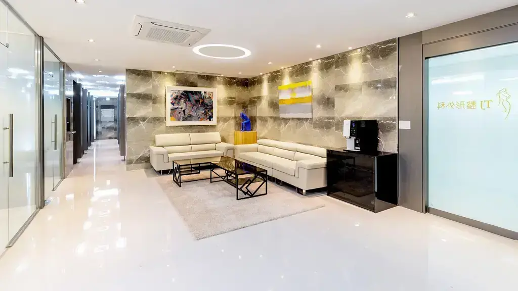 Interior waiting area shown on the TJ Plastic Surgery directory profile